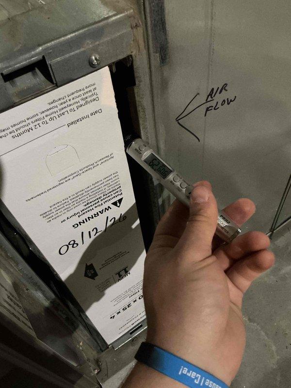 Completed monthly preventive maintenance on two HVAC cooling systems. Performed comprehensive system inspections including airflow measurements, temperature verification at thermostat showing 70°F setpoint, and documented operational parameters with readings of 69.6°F at supply ductwork. Both units operating within normal specifications with proper airflow direction confirmed and marked on equipment.