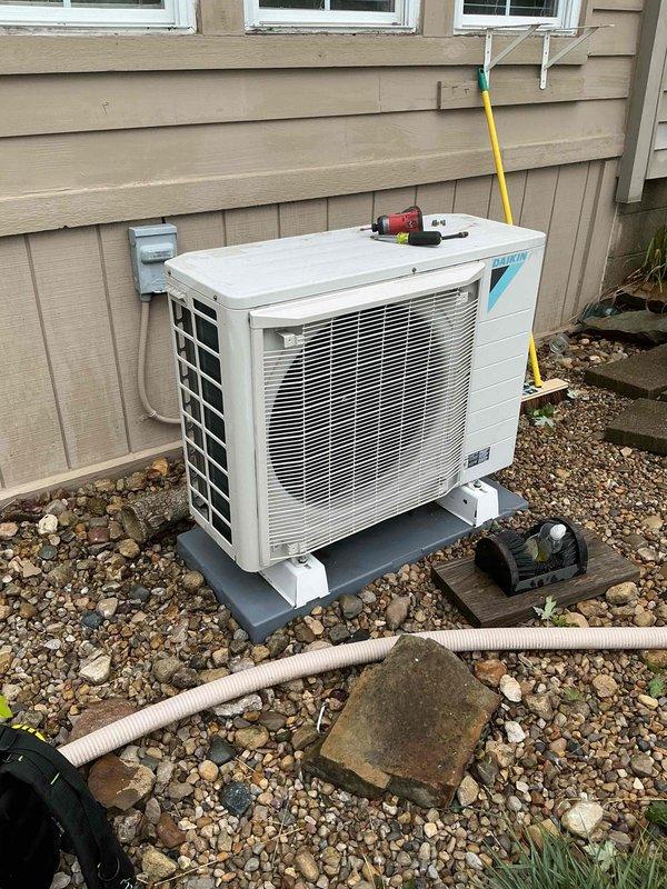 Completed basic monthly cooling maintenance visit on Daikin condensing unit. Performed standard system inspection, checked refrigerant lines and electrical connections, verified proper operation with temperature readings showing 72.4°F, and documented UV light system presence. Unit operating within normal parameters with no issues identified during this recurring maintenance service.