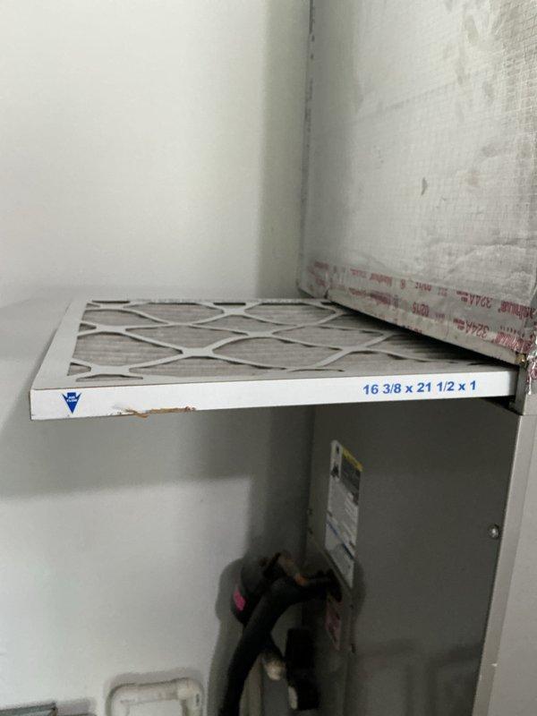 Completed basic monthly cooling maintenance visit on HVAC system. Replaced standard air filter measuring 16 3/8 x 21 1/2 x 1 inch as part of recurring preventive maintenance program. Inspected evaporator coil and noted moderate dust and dirt accumulation on aluminum fins with debris collection in drain pan area, which is consistent with normal operational wear between service intervals. Unit operating within normal parameters with all components functioning as designed.