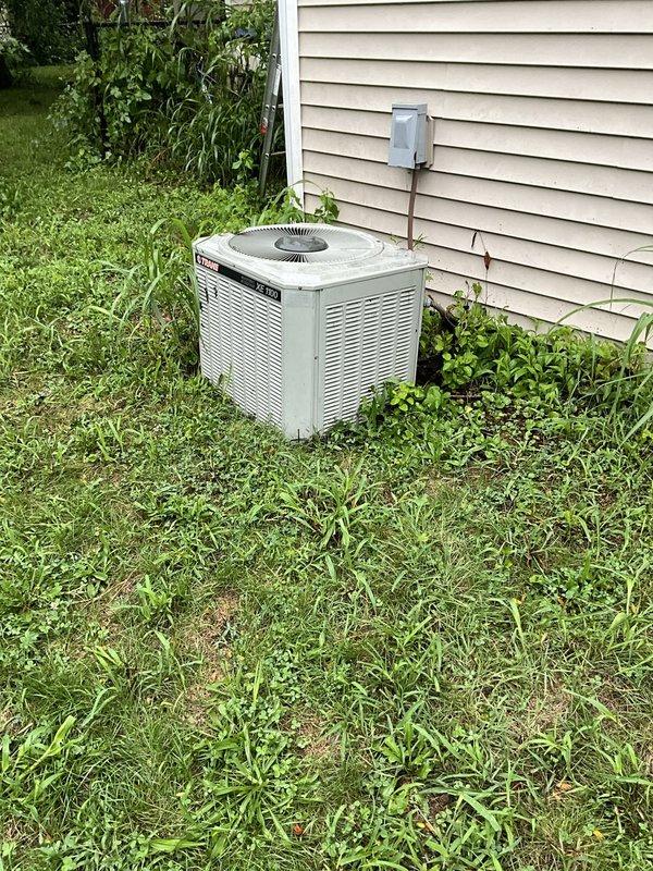 Performed comfort consultation to evaluate aging R-22 air conditioning system and provided full system replacement options. Due to refrigerant leak in existing system manufactured in 1995, temporarily topped off unit with R-22 refrigerant and leak seal to maintain cooling operation while customer considers replacement estimates.