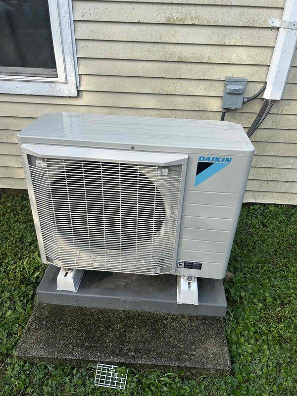Completed monthly cooling maintenance on Daikin condensing unit and air handler system. Inspected evaporator coil showing normal dust accumulation on fins, verified outdoor unit operational with condenser coil clear and electrical disconnect secure. All components functioning within normal parameters.