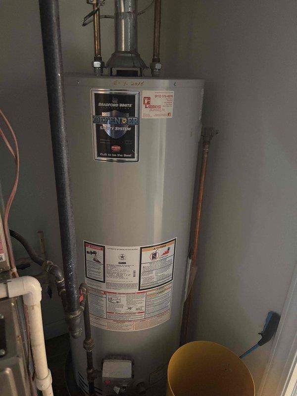 Completed Basic Cooling Visit monthly recurring service maintenance, which included replacing the 20x25x4 air filter provided with membership. Verified thermostat operation showing Zone 1 cooling mode functioning properly at 76°F setpoint, and documented existing water heater installation in mechanical room for reference.