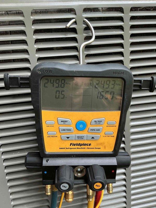 Returned to property to install warranty replacement compressor on outdoor air conditioning unit. Installed new compressor, evacuated refrigerant lines, and recharged system to manufacturer specifications. Performed system startup and diagnostic testing using digital manifold gauges to verify proper refrigerant pressures and temperatures on both low and high sides. Confirmed unit operating within normal parameters and cooling effectively.