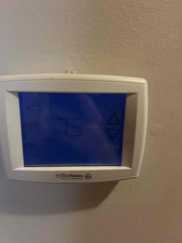 Responded to follow-up service call for geothermal unit reported as not operating properly. Inspected Premier 2 microprocessor logic control system and reviewed wiring schematic for diagnostic purposes. Evaluated thermostat display showing alert indicator and verified control panel communication with geothermal heat pump. Advised customer to contact office immediately if unit malfunctions again for further troubleshooting and potential component replacement.