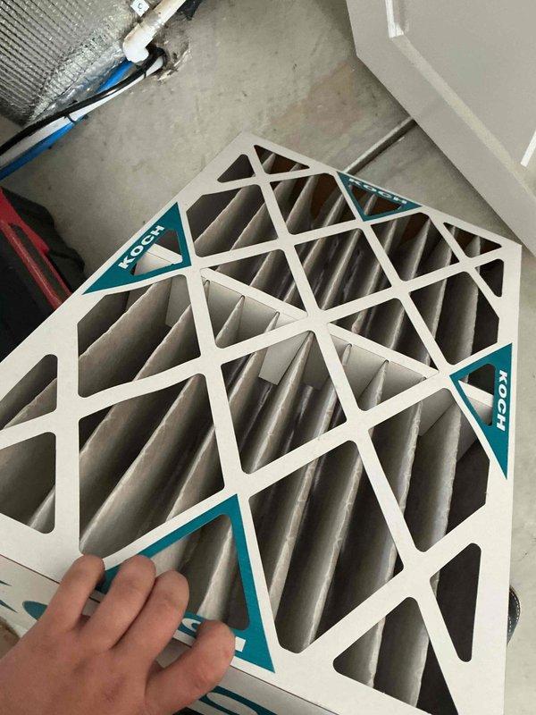 Completed monthly preventive maintenance visit for cooling system under CCC Basic Monthly service agreement. Replaced HVAC air filters with new Koch brand pleated filters featuring white cardboard frames and teal corner accents. Filter size was not previously documented in service records but has now been identified for future reference. System operational upon completion of service.