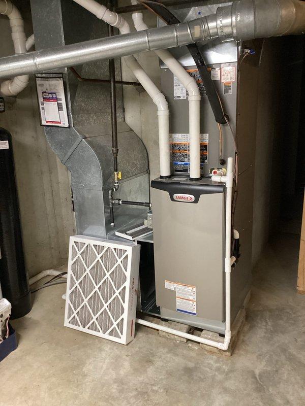 Completed prepaid cooling maintenance tune-up on 16-year-old Carrier system. Performed comprehensive inspection of indoor Lennox furnace unit and outdoor condensing unit, verified proper operation of all components, checked refrigerant levels, inspected electrical connections and disconnect boxes, examined ductwork and plenum assembly, and confirmed air filter condition. All systems operating within normal parameters with no deficiencies noted.