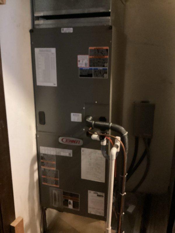 Completed annual cooling maintenance visit on Lennox HVAC system as part of recurring service agreement. Performed comprehensive inspection of indoor furnace/air handler unit and outdoor condensing unit, verified proper operation of all components including refrigerant lines, electrical connections, and airflow systems. Replaced 18x20x1 air filter and documented equipment condition with photos showing both indoor mechanical closet installation and outdoor condenser unit positioned on concrete pad adjacent to building foundation.