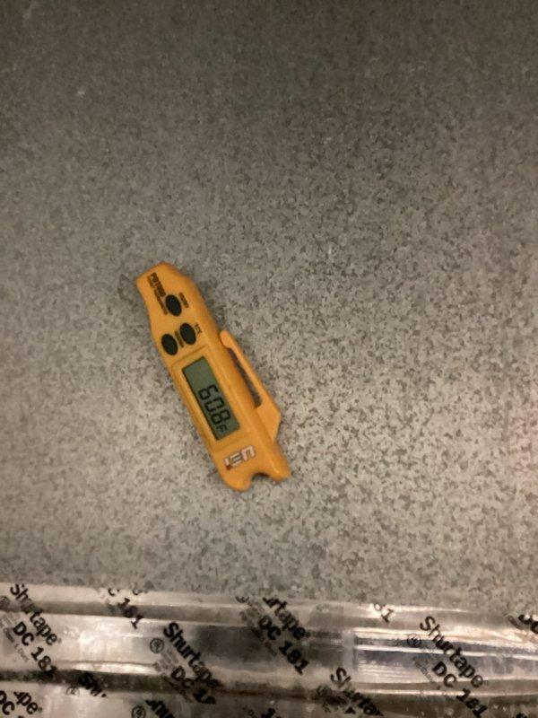 Responded to emergency no-cooling call for 15-year-old Bryant A/C system where outdoor unit was attempting to start but failing to run. Upon arrival, diagnosed failed start capacitor with multimeter reading of 6.00 microfarads, well below manufacturer specifications. Replaced defective dual run capacitor, tested system operation, and verified proper amperage draw and compressor function. Unit restored to normal cooling operation.