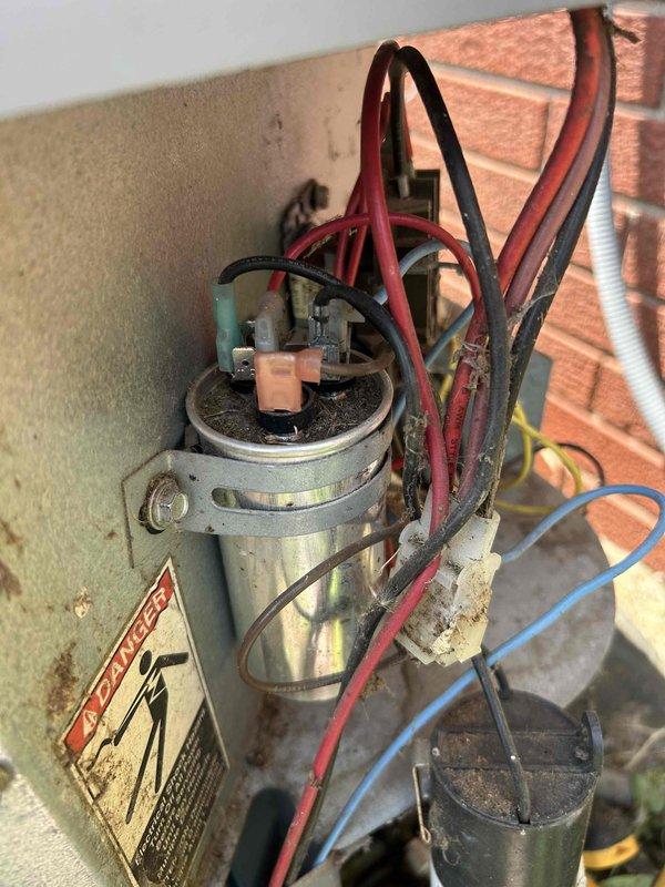 Completed basic monthly cooling maintenance visit on residential air conditioning system. Inspected outdoor condenser unit positioned against exterior brick wall, verified proper clearances and airflow around unit. Examined electrical components including capacitor, contactor assembly, and associated wiring connections for signs of wear or deterioration. Replaced 16x25x1 air filter per maintenance agreement. Noted dust accumulation on electrical panel and general aging of components but system operating within normal parameters. All safety labels intact and visible on equipment.