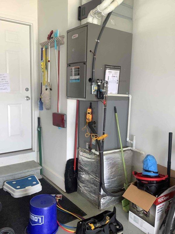 Completed comprehensive annual cooling system tune-up on 9-year-old residential AC unit. Performed standard maintenance protocol including inspection of outdoor condenser unit, verified proper operation of compressor and condenser fan motor, checked refrigerant levels and electrical connections, cleaned condenser coils, and inspected indoor air handler with associated ductwork and drainage system. All components operating within normal parameters; system tested and left in good working condition.