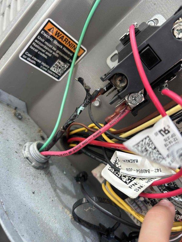 Responded to no cooling call with indoor unit operating but outdoor unit not running. Inspected outdoor condensing unit electrical components including contactor, wiring connections, and control panel. Diagnosed failure in outdoor unit electrical system, documented all wire connections and component conditions with photographs for service records.