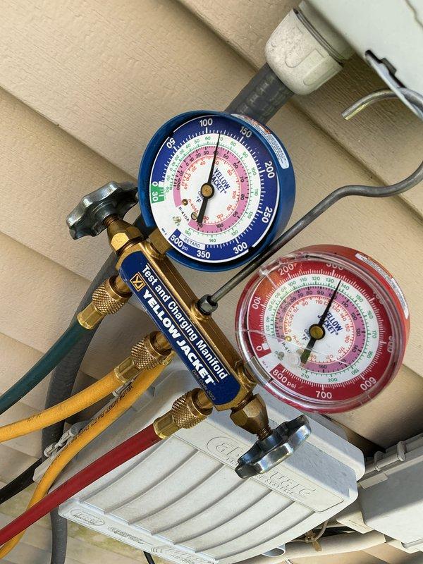 Completed comprehensive cooling maintenance on 12-year-old Carrier air conditioning system with 2019 condenser model. Performed full AC tune-up including refrigerant pressure testing using manifold gauge set to verify proper system charge and operating pressures within manufacturer specifications. Inspected electrical components, capacitor, contactor, and all wire connections inside control panel for proper operation and signs of wear. All system parameters found to be within normal operating range; unit running efficiently with no deficiencies noted.