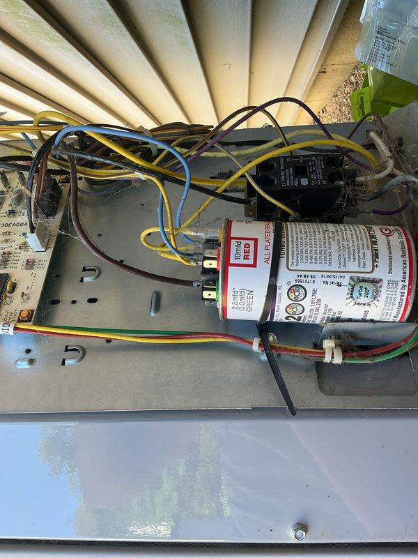 Completed comprehensive cooling maintenance on 12-year-old Carrier air conditioning system with 2019 condenser model. Performed full AC tune-up including refrigerant pressure testing using manifold gauge set to verify proper system charge and operating pressures within manufacturer specifications. Inspected electrical components, capacitor, contactor, and all wire connections inside control panel for proper operation and signs of wear. All system parameters found to be within normal operating range; unit running efficiently with no deficiencies noted.