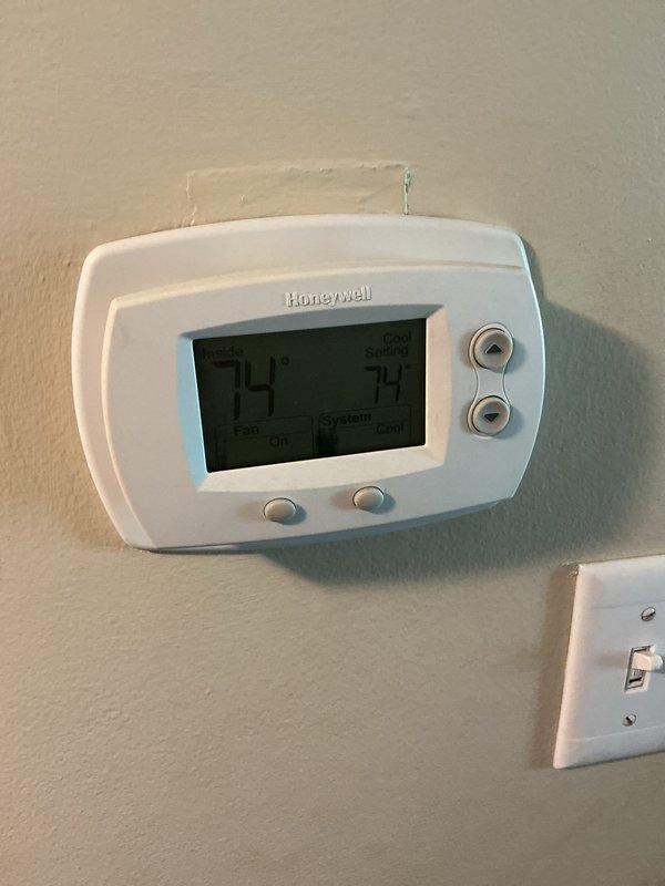 Completed basic monthly heating maintenance visit on HVAC system. Performed standard heating system inspection, verified thermostat operation showing 74°F setpoint with system functioning properly, and recorded supply air temperature reading of 72.2°F. Replaced 20x22x1 air filter as part of routine preventative maintenance to ensure optimal system performance and air quality.