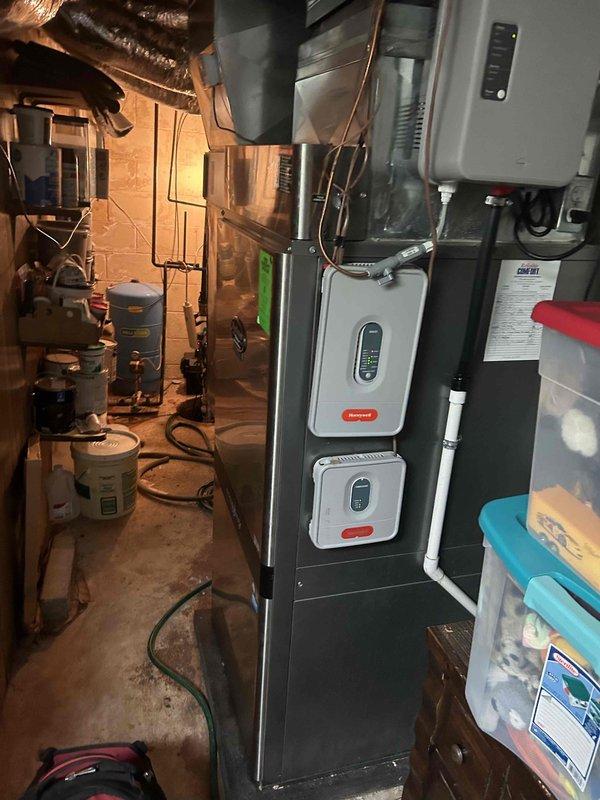 Completed basic monthly cooling maintenance on residential HVAC system. Inspected blower motor assembly, capacitor, and electrical connections within air handler unit. Verified proper operation of thermostat controls and system components, documented equipment condition with photos for service records.