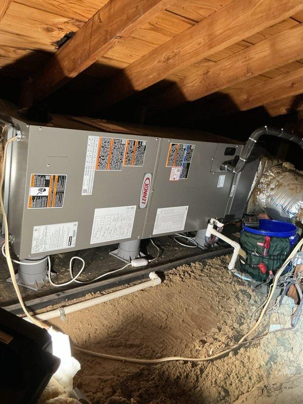 Completed annual cooling maintenance visit on Lennox air handler system located in crawl space. Performed comprehensive inspection of horizontal-mount unit including examination of refrigerant lines, condensate drainage system with PVC piping, and flexible metallic ductwork connections. Noted current air filter is 20x20x4 size and requires replacement by customer as this size is not included in standard maintenance coverage. Inspected cabinet components, verified proper labeling and manufacturer specifications visible on unit exterior. Checked installation mounting and clearances beneath floor joists. System operational at time of service completion. Customer advised filter replacement needed and that CCC membership has expired but service was owed under previous agreement.