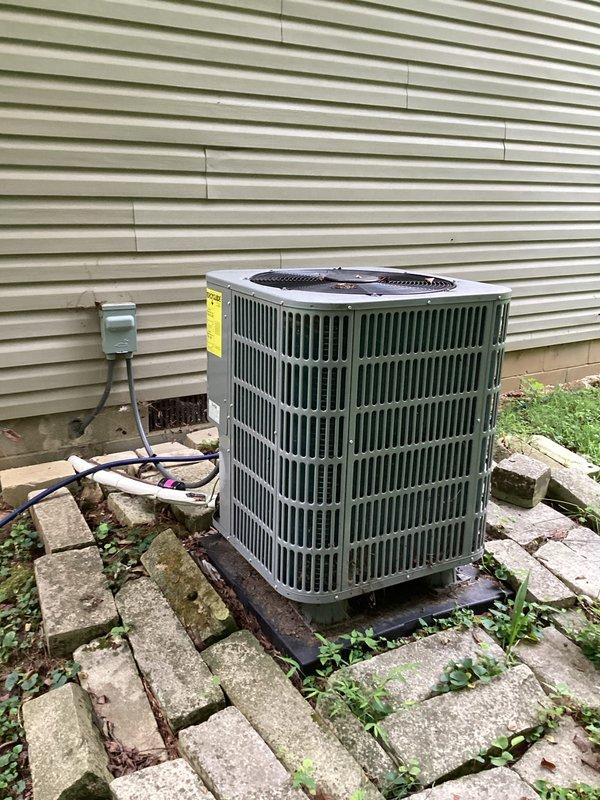 Replaced defective condenser fan motor and temperature sensor on outdoor air conditioning unit. System tested and verified operational with proper airflow and accurate temperature readings upon completion.