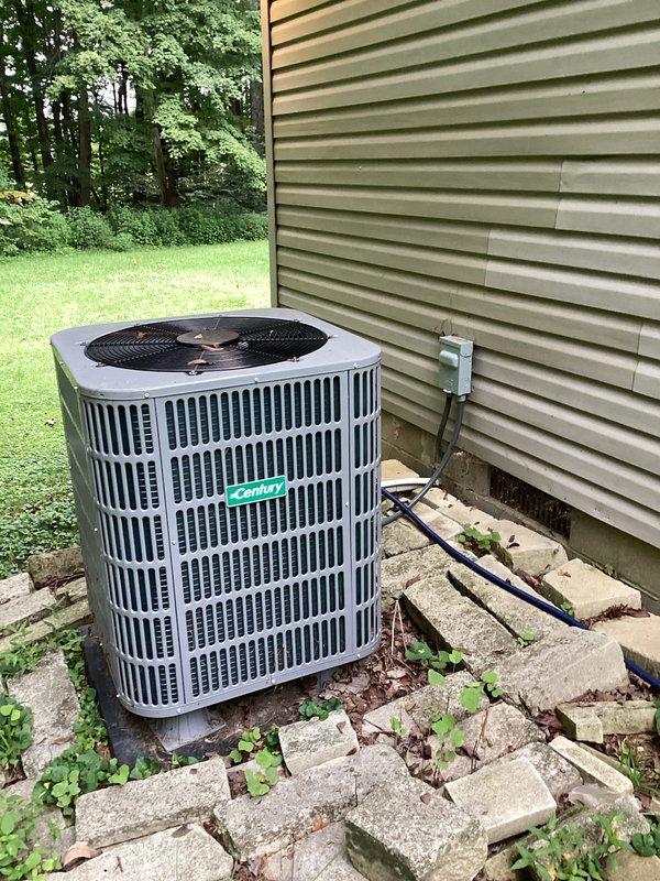 Replaced defective condenser fan motor and temperature sensor on outdoor air conditioning unit. System tested and verified operational with proper airflow and accurate temperature readings upon completion.