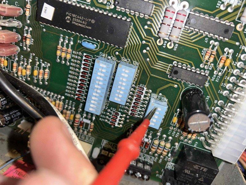 Returned to site with replacement control board for HVAC system. Performed diagnostic testing on new printed circuit board using multimeter to verify proper voltage and component functionality before installation. Removed failed control board from equipment panel, disconnected all wire harnesses and connections, installed new board, reconnected all electrical connections, and verified system operation upon completion.