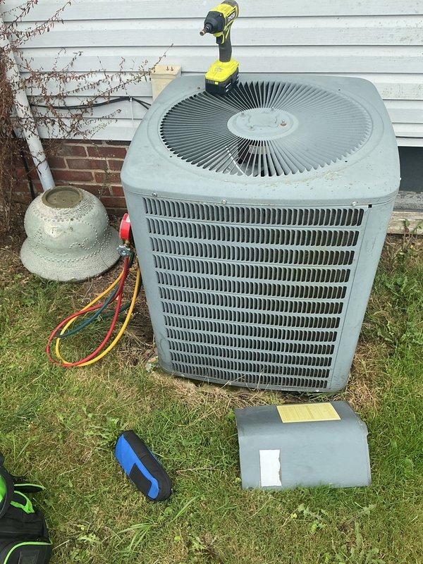 Completed rescheduled basic monthly cooling maintenance visit on residential air conditioning system. Performed standard system inspection, checked thermostat operation and temperature settings, and conducted outdoor condenser unit evaluation with refrigerant pressure diagnostics using manifold gauges. All components operating within normal parameters at time of service.