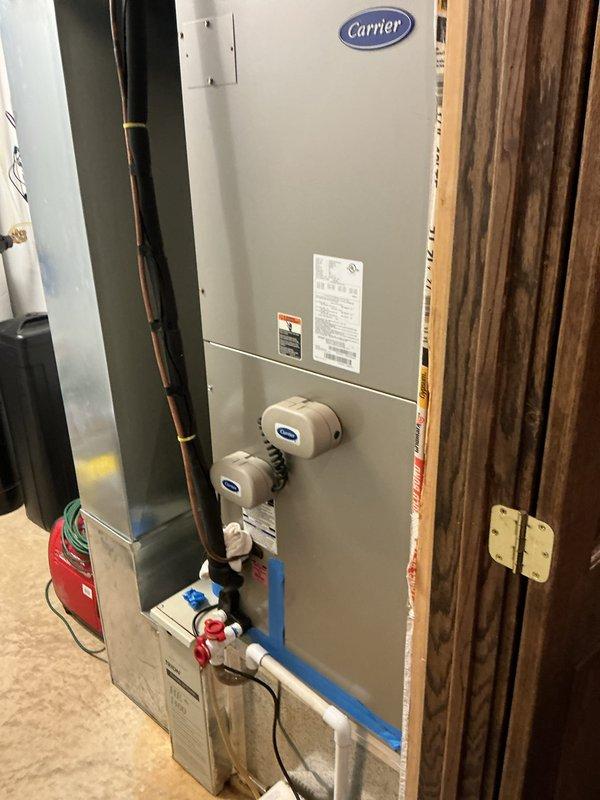 Completed comprehensive maintenance service on both heating and cooling systems. Performed full system inspection of Carrier air handler unit and associated HVAC components. Verified thermostat operation and programming settings, confirming proper temperature control and scheduling functions. Inspected refrigerant lines, condensate drainage system with PVC piping and pump, and all electrical connections. Checked air handler cabinet, safety labels, and mounting. Documented equipment condition through photographs. System operating within normal parameters. Customer advised that 16x25x4 air filter is not included with service agreement, which renews 7/29/26.