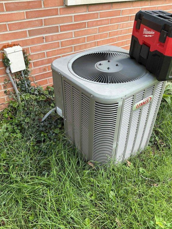 Completed monthly commercial cooling maintenance on Lennox outdoor condenser unit. Performed system diagnostics and temperature measurements using digital testing equipment to verify proper operation. Inspected condenser coils, fan assembly, and electrical components. Unit found operating within normal parameters. Documented filter size as requested for future maintenance reference. Cleared vegetation from around unit base to ensure adequate airflow and prevent potential efficiency issues.