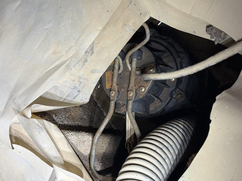 Responded to service request to inspect and verify operation of two sump pumps located in crawlspace. Accessed crawlspace through foundation entry point and located both sump pump units. Performed operational testing on both pumps to confirm functionality and proper discharge. Verified discharge lines were clear and draining properly to exterior of property. Inspected pump float switches, check valves, and electrical connections on both units. Documented existing conditions with photographs showing exterior discharge point with proper drainage away from foundation and crawlspace mechanical systems including pump installation and associated plumbing components. Both sump pumps confirmed to be in working order with no issues identified during inspection.