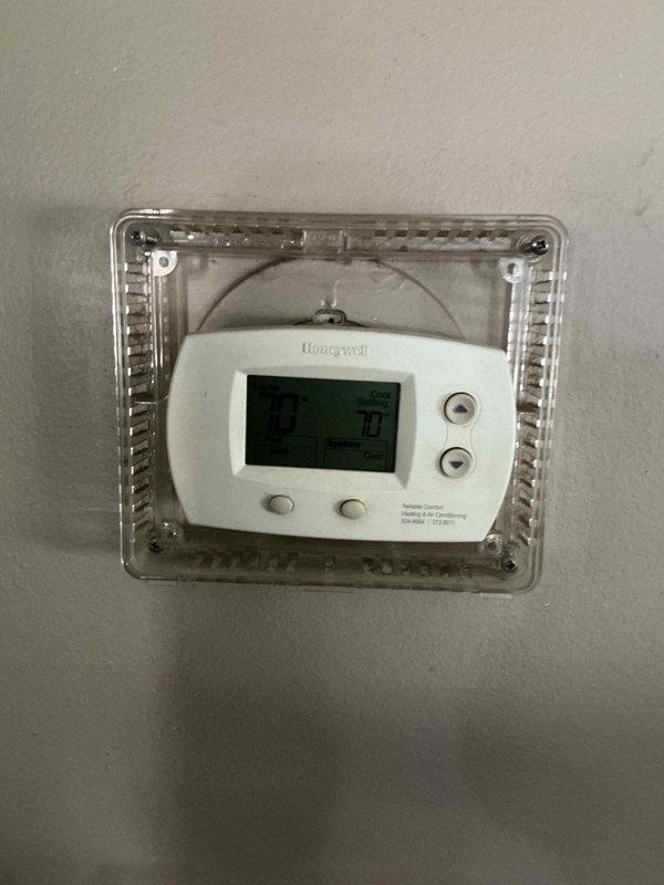 Completed routine cooling system maintenance on residential HVAC unit. Verified thermostat operation at 77°F, measured supply air temperature at 83.8°F at register, and replaced 20x20x1 air filter per maintenance protocol.