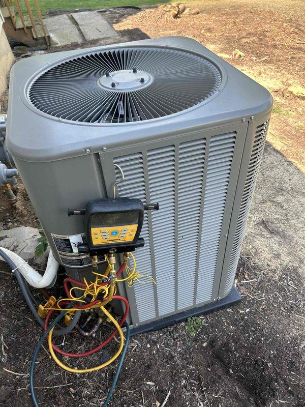 Responded to service call for residential air conditioning system with refrigerant leak. Located leak at severely corroded service valve assembly on outdoor condenser unit. Repaired leak at valve connection point, evacuated system to remove air and moisture, and recharged unit to manufacturer specifications using manifold gauge set to verify proper refrigerant levels and system pressures.