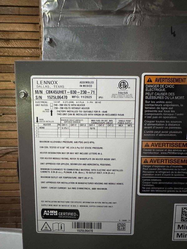 Completed installation of Lennox heat pump system model CBX45UHV045E-030-230-71 with air handler unit mounted in attic space. Installed dedicated electrical circuit wiring to support heat pump operation and stove, routing cables through attic framework and securing all electrical connections per manufacturer specifications and code requirements. System tested and verified operational at rated voltage parameters.