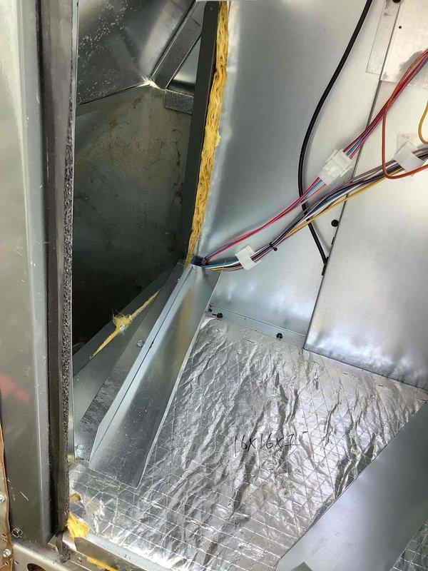 Completed installation of Goodman gas/AC package unit with proper insulation, wire routing, and sealing at all panel connections. Installed and programmed Honeywell Home Smart thermostat for system control and operation.