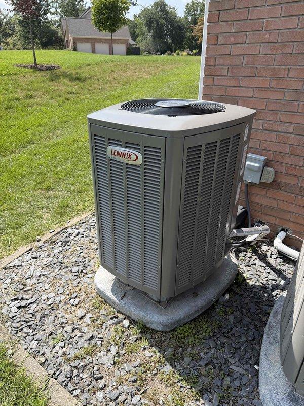 Completed annual cooling maintenance on two HVAC systems at residential property. Performed comprehensive inspection of outdoor Lennox condensing unit, checking refrigerant levels, electrical connections, and compressor operation. Verified proper amp draw using digital multimeter to ensure system operating within manufacturer specifications. Inspected condenser coil condition, fan motor operation, and contactor functionality. Checked disconnect box and all electrical components for signs of wear or damage. Cleaned unit exterior and verified adequate airflow through louvers. Confirmed both systems cooling properly with all components functioning as designed. Recommended 20x25x4 filter replacement per maintenance schedule.