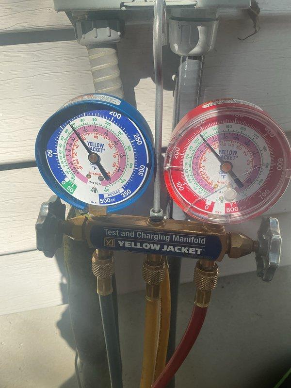 Completed comprehensive cooling maintenance service including system diagnostics and performance verification. Utilized manifold gauge set to measure refrigerant pressures and confirm proper system operation across both high and low side readings. Inspected condensing unit, verified electrical connections, and documented equipment condition through photographic records. Standard 16x25x4 filter not included with this basic monthly maintenance visit.