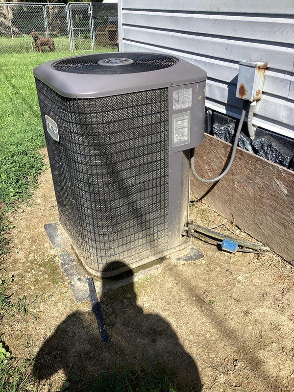 Replaced faulty high pressure switch on residential air conditioning system. Disconnected refrigerant lines, removed defective switch, installed new component, and reconnected all electrical connections to restore proper system operation and safety controls.