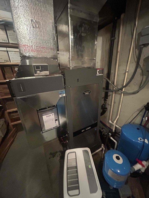 Completed annual basic cooling maintenance visit on residential HVAC system located in basement utility area. Performed standard preventive maintenance procedures including inspection of furnace/air handler unit, ductwork, and associated equipment. All components found operating within normal parameters; system ready for cooling season operation.