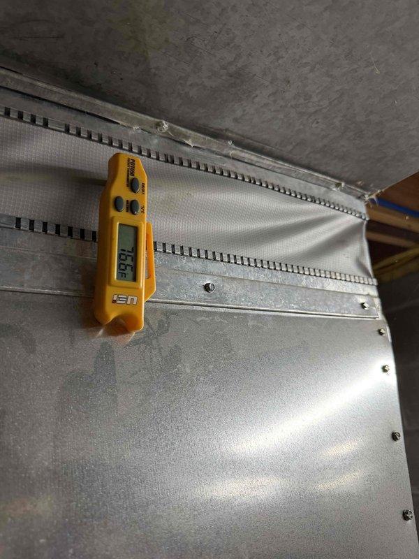 Returned to property and successfully replaced the BLU tube UV bulb in the HVAC system. Verified proper operation with temperature readings showing 158°F at the ductwork, confirming system functionality after bulb replacement.