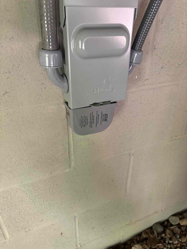 Completed full HVAC system installation including Lennox air conditioning unit and gas furnace. Installed new digital touchscreen thermostat on interior wall for system control and programming. Mounted exterior electrical disconnect box with proper conduit routing and secured all electrical connections per code requirements.