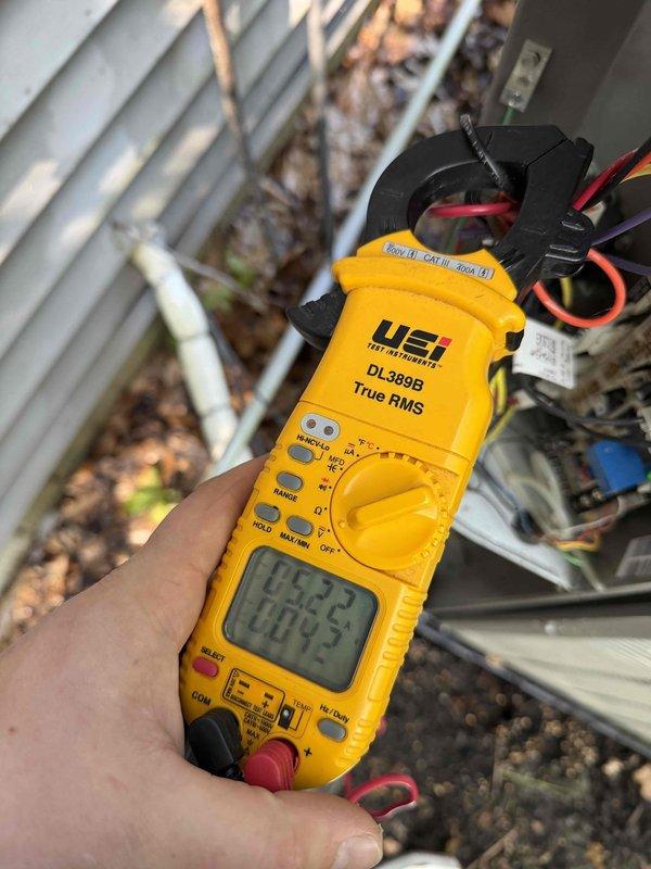Completed warranty replacement of blower motor and control board on Lennox system. Verified proper electrical readings and system operation after installation, with unit running at 123.2V and 60.23Hz as confirmed by meter testing.
