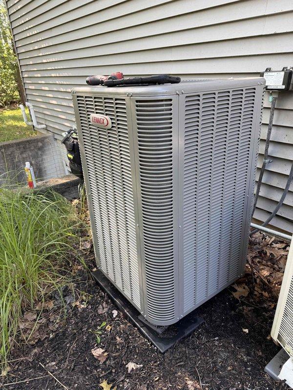 Completed warranty replacement of blower motor and control board on Lennox system. Verified proper electrical readings and system operation after installation, with unit running at 123.2V and 60.23Hz as confirmed by meter testing.