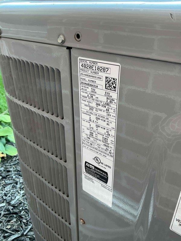 # HVAC Maintenance - Cooling System Service

Completed comprehensive cooling maintenance on Carrier outdoor condensing unit, serial number 4820E10287. Performed standard preventive maintenance procedures including inspection of electrical connections, refrigerant levels, and overall unit operation. Documented equipment condition through photographs showing unit positioned on concrete pad with proper clearances maintained. Verified condenser coils, fan operation, and external components functioning within normal parameters. Unit exterior showing typical wear consistent with age and outdoor exposure. Electrical disconnect and line set connections inspected and found secure. Mulch bed surrounding unit maintained with adequate drainage. Service completed per Basic Monthly maintenance agreement specifications. Customer advised that 20x20x4 filter not included in service and requires separate replacement by homeowner.