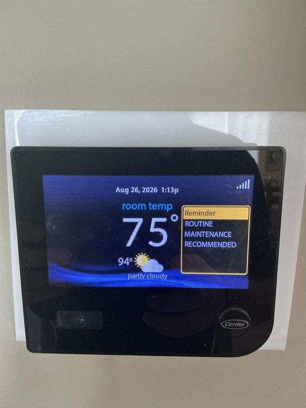 Completed routine monthly maintenance on CCHP cooling system. Performed standard inspection and service procedures per basic monthly maintenance protocol. System operating within normal parameters at time of service, with thermostat displaying 75°F indoor temperature against 94°F outdoor conditions. Noted maintenance reminder active on Carrier thermostat display. Air filter size 24x24x4 not included in this service visit and will require separate provision by customer or future service call.