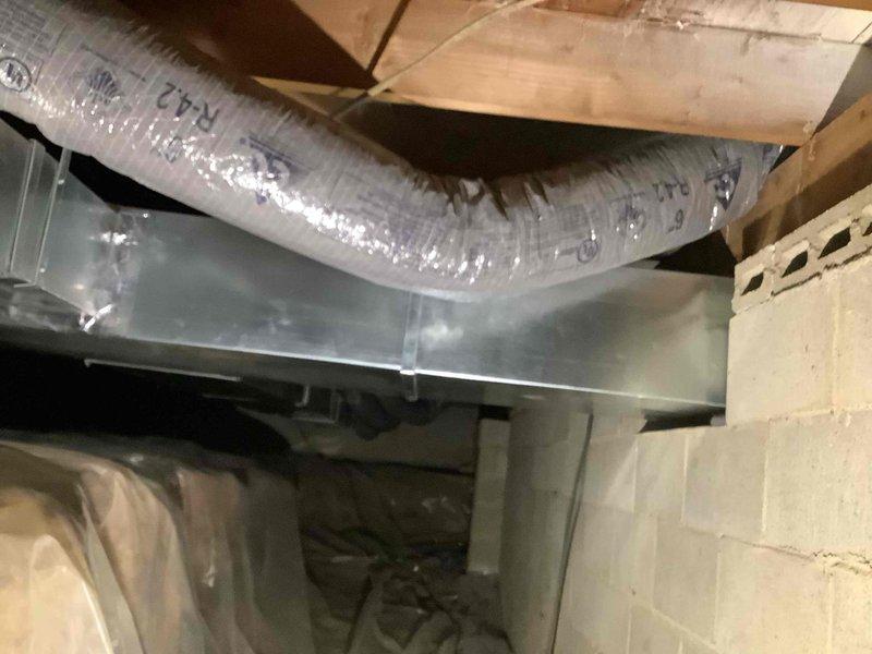 Installed new flexible ductwork and metal plenum in basement utility space to resolve airflow deficiencies in the HVAC system. Replaced 14x14x1 return air filter and verified proper system operation upon completion.
