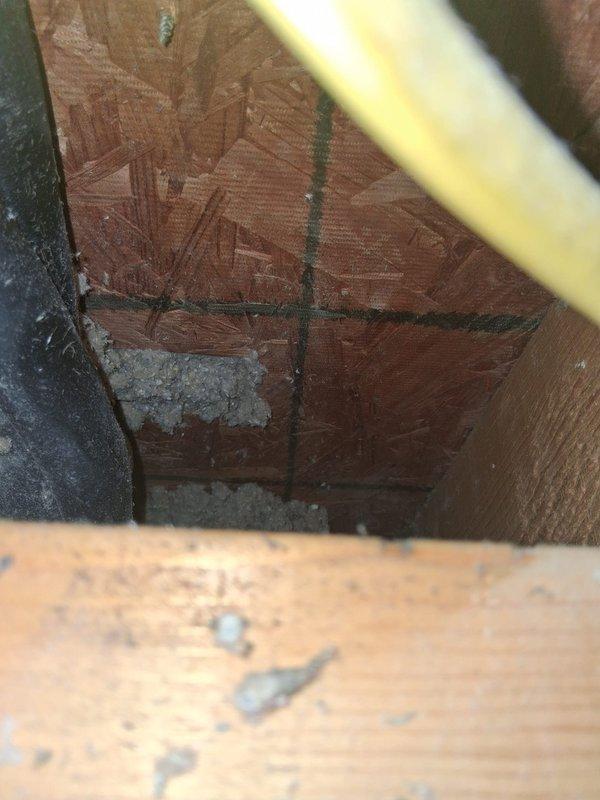 Responded to warranty call for mini split system leaking down wall due to suspected uninsulated copper refrigerant line. Upon inspection, located exposed copper line section in attic/crawl space area where insulation was missing or improperly installed at structural junction point. Documented conditions with photos showing wooden framing, refrigerant lines, and condensation accumulation. Identified gap in line insulation as source of condensate formation on exposed copper, causing water to run down interior wall. Corrected insulation deficiency on refrigerant line to prevent future condensation and leakage issues, ensuring proper coverage at all connection points and structural penetrations per manufacturer specifications.