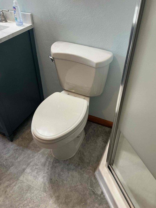 Completed installation of customer-provided toilet in main floor bathroom with same-day service. Removed and hauled away existing two-piece toilet, installed new unit with proper sealing and connection to existing water supply and drain lines. Inspected crawl space sump pump system that failed to activate during recent heavy rainfall events. Verified pump operation, checked float switch mechanism, and tested automatic activation cycle to ensure proper function during future rain events.