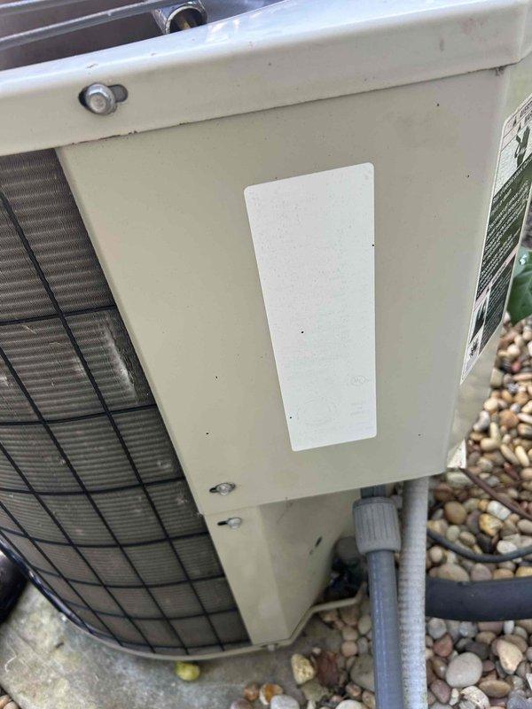 Responded to service call for non-operational outdoor air conditioning unit. Upon arrival, performed diagnostic inspection of condenser unit and associated components. Inspected condenser coils, electrical connections, refrigerant lines, and condensate drainage system. Documented equipment condition including protective grille, access panels, and PVC condensate piping with proper drainage connections. Unit evaluated and photographed for service records.