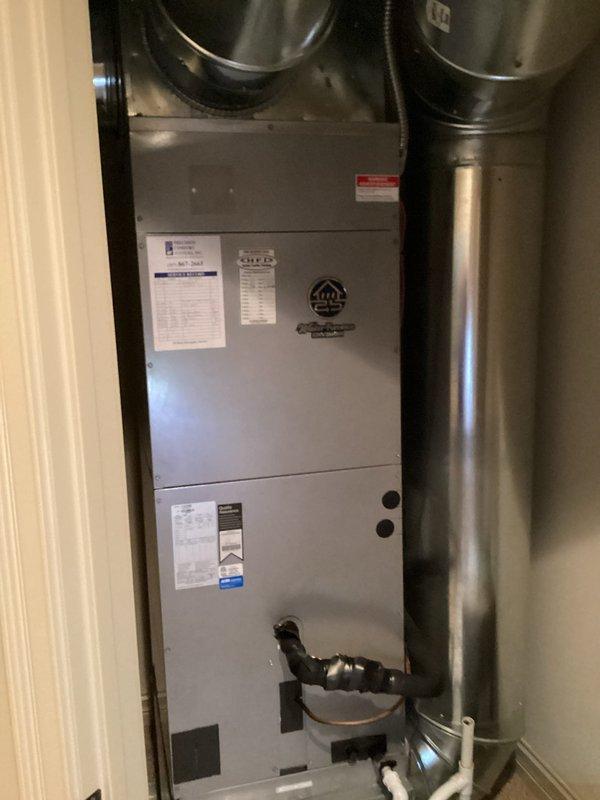 Responded to service call for reported ductwork leakage issues. Upon inspection, located compromised section of ductwork requiring access through wall cavity. Created access opening to assess duct system connected to vertical air handler unit. Identified leak source at duct connection points and documented system configuration including supply/return air distribution, refrigerant lines, and condensate drainage system for repair recommendations.