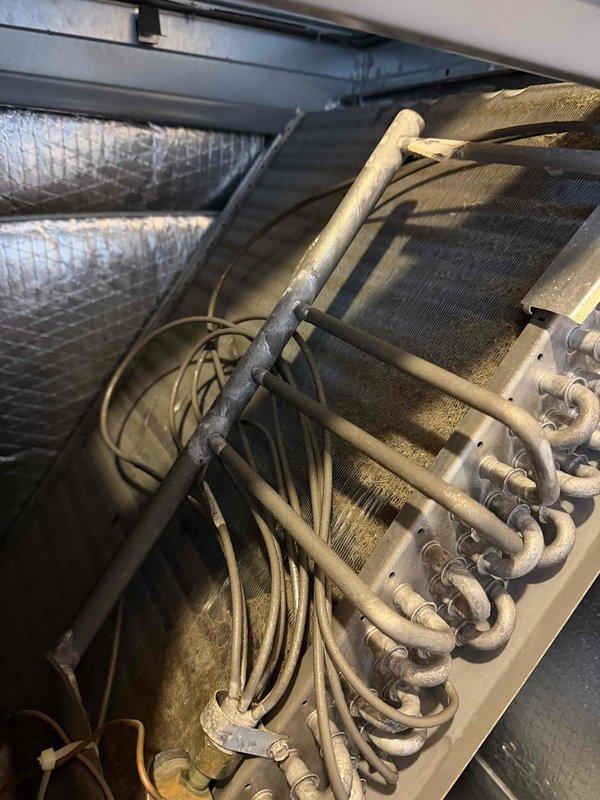 Completed annual cooling system maintenance on residential HVAC unit. Performed comprehensive inspection of evaporator coil assembly, verified refrigerant line connections and insulation integrity, checked condensate drain system operation, and inspected air handler unit including all safety controls and electrical connections. System is operating within manufacturer specifications; customer advised that 20x20x4 filter is not included in service agreement and should be replaced separately.