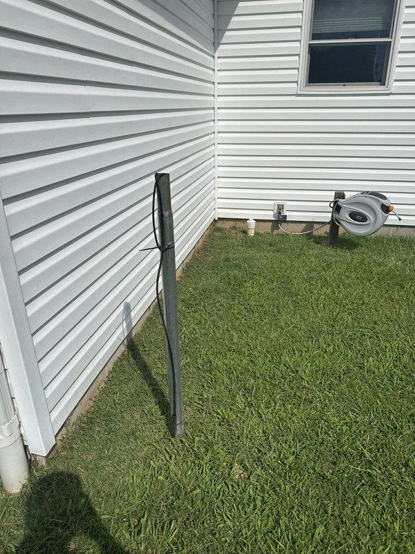 Conducted free estimate for installation of propane gas line to stove at residential property. Assessed exterior routing options along building perimeter with white vinyl siding, evaluating optimal path for gas line installation from propane source to kitchen appliance location. Documented site conditions and measurements for preparation of detailed proposal.