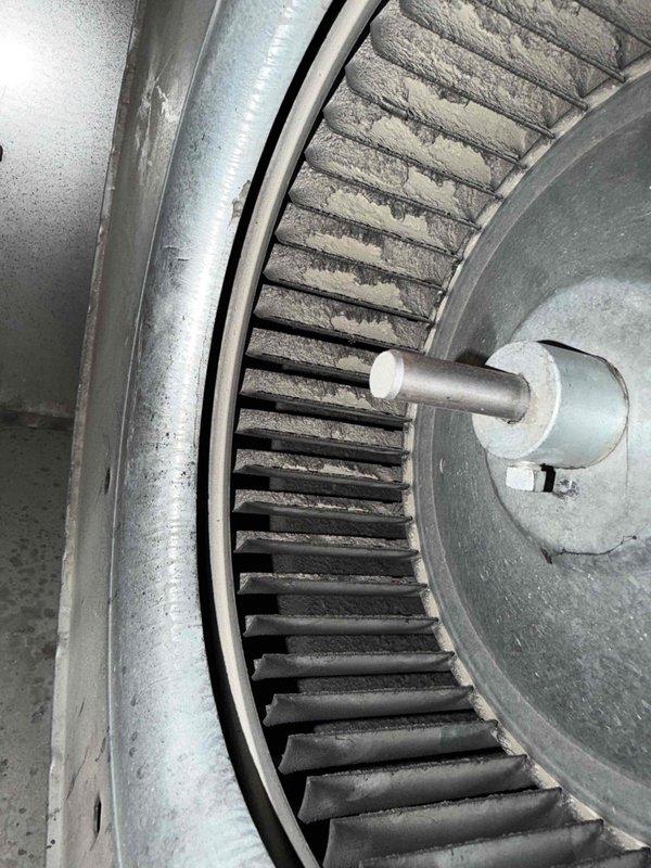 Completed basic monthly heating maintenance visit on two HVAC systems. Performed standard heating season inspections including visual assessment of blower assemblies and air handler components. Documented significant dust and debris accumulation on blower wheel blades and lint buildup around air handler access areas, indicating need for future cleaning to maintain optimal system efficiency and airflow.