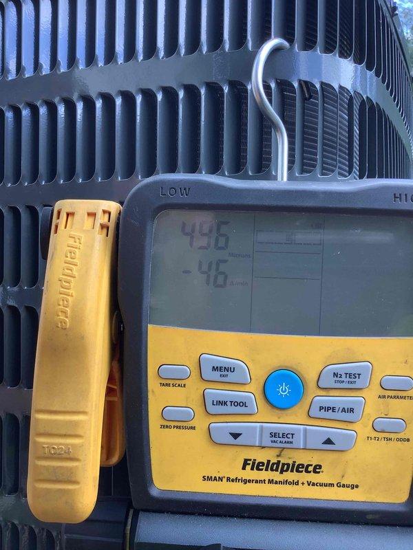 Completed full HVAC system replacement in mobile home, installing new air conditioning condenser unit and gas furnace. New outdoor condensing unit was positioned on concrete pad with proper gravel base for drainage and airflow, secured electrical conduit connection to structure, and verified all refrigerant line connections. Performed system commissioning using digital manifold gauges to confirm proper refrigerant charge levels and system pressures, ensuring optimal performance of the complete heating and cooling system.